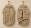 Oatmeal cable knit pet jumper with full sleeves and a ribbed turtleneck, shown front and back on hangers