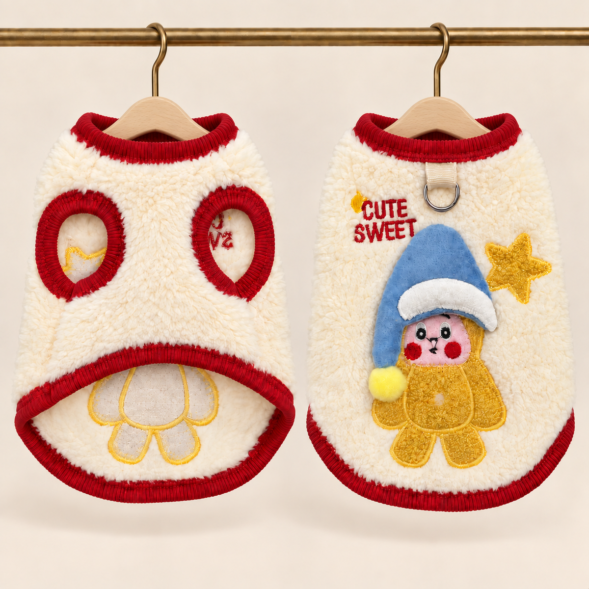 Cream sherpa pet vest bound in red rib with Cute Sweet embroidery, a bunny in a blue nightcap and a lead D-ring